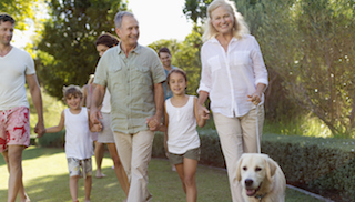 Family walking their dog