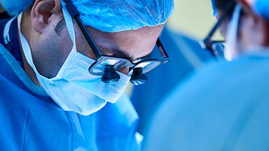 doctor and patient reviewing a spinal x-ray