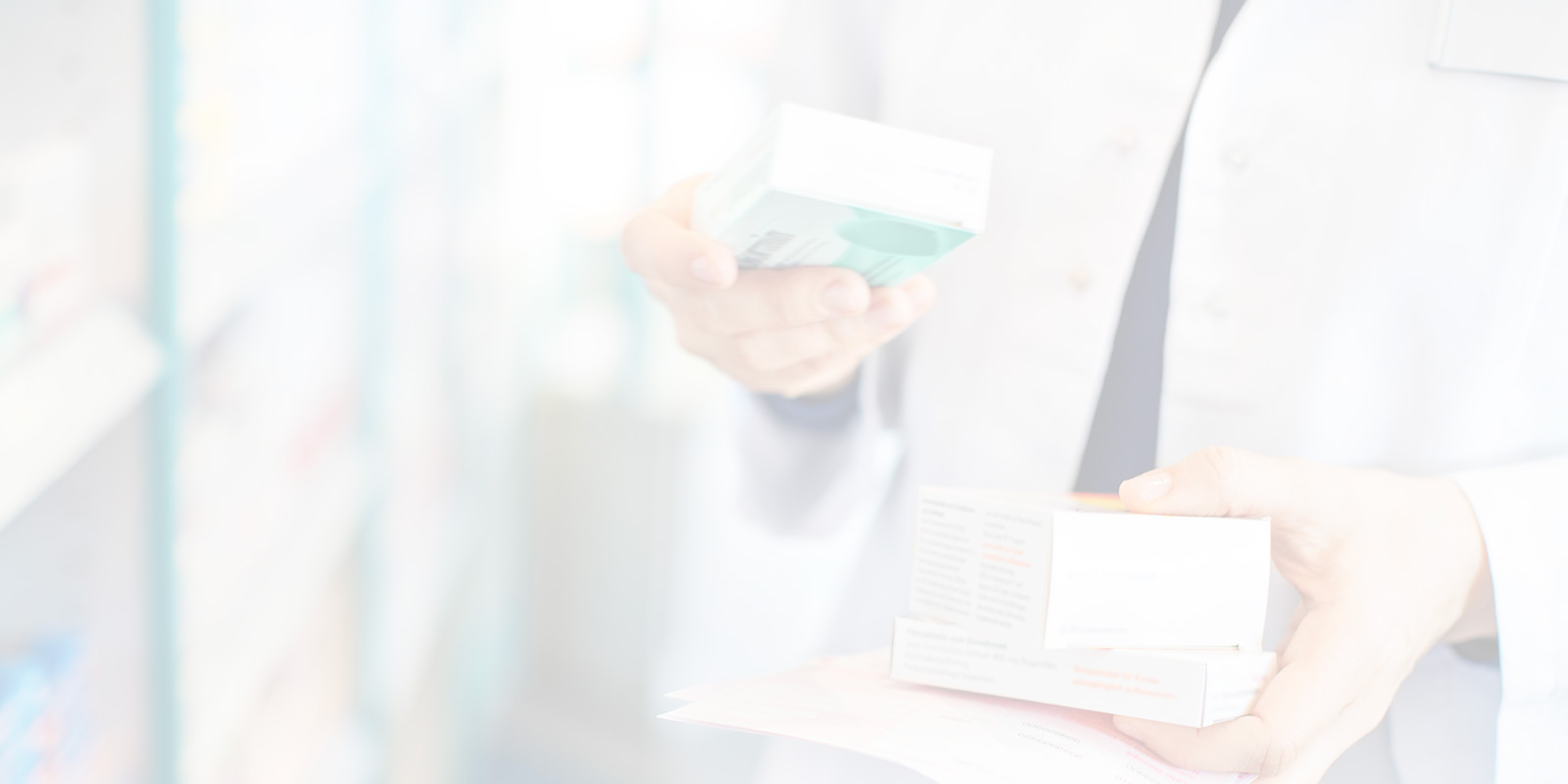 Pharmacist examining a bottle of medication.