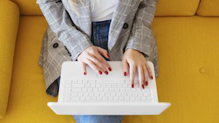 woman typing on computer