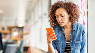 woman looking at phone